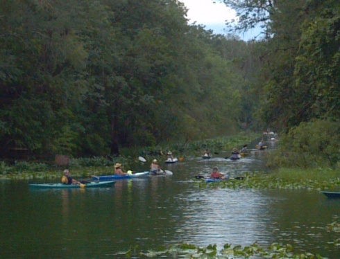 Paddlers charge the iconic Silver River, protesting Adena Springs Ranch